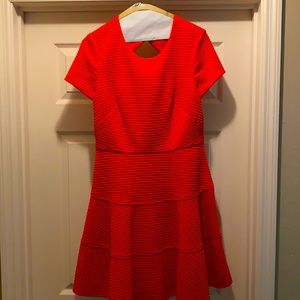 Eliza J coral dress with cutout back.